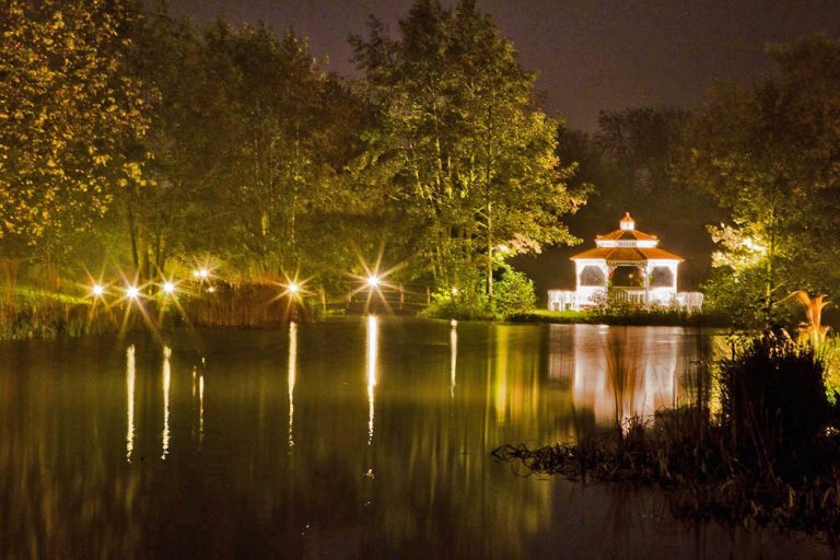 Minstrel Court lake Wedding Pavilion illuminated at night
