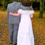 Minstrel Court Wedding - bride and groom with leaves