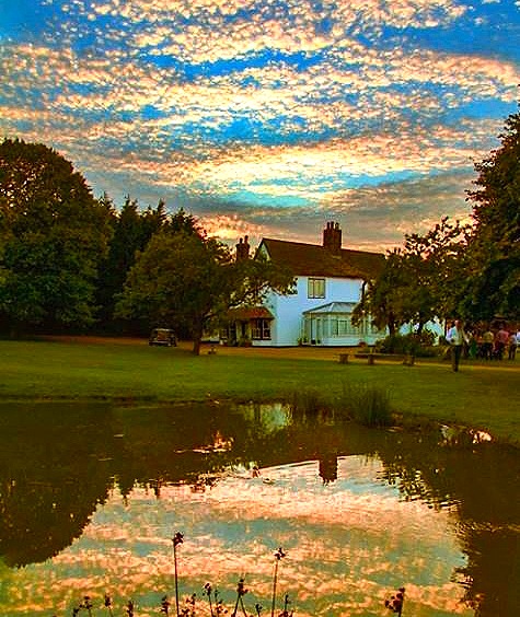 Minstrel Court Wedding - clouds over the lake